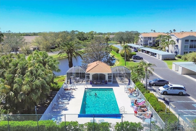 9630 Club S Cir Unit 6303, Sarasota, FL 34238 - community pool featuring glass enclosure and a water view