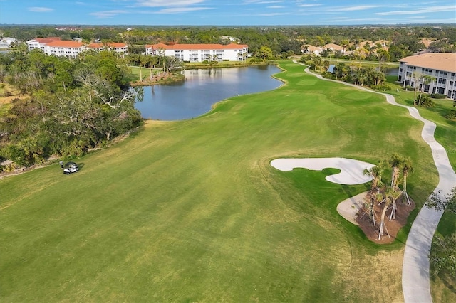 9630 Club S Cir Unit 6303, Sarasota, FL 34238 - view of property location featuring a nearby body of water, a golf club, apartment complex / building, and a tree filled landscape