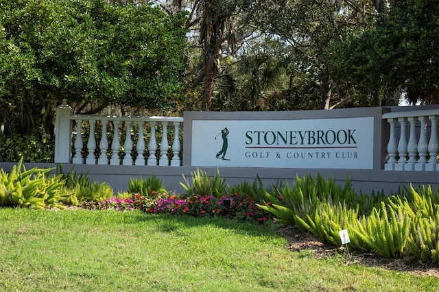 9630 Club S Cir Unit 6303, Sarasota, FL 34238 - community / neighborhood sign featuring a yard