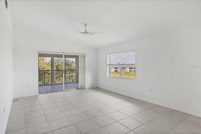 9630 Club S Cir Unit 6303, Sarasota, FL 34238 - tiled empty room with a ceiling fan, healthy amount of natural light, and lofted ceiling