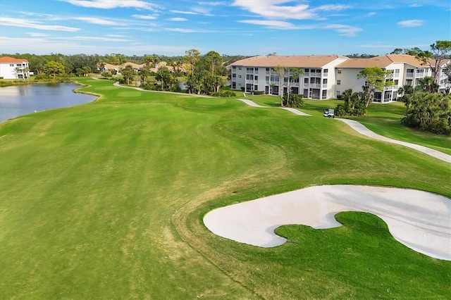 9630 Club S Cir Unit 6303, Sarasota, FL 34238 - view of property's community featuring a water view, view of golf course, and a yard