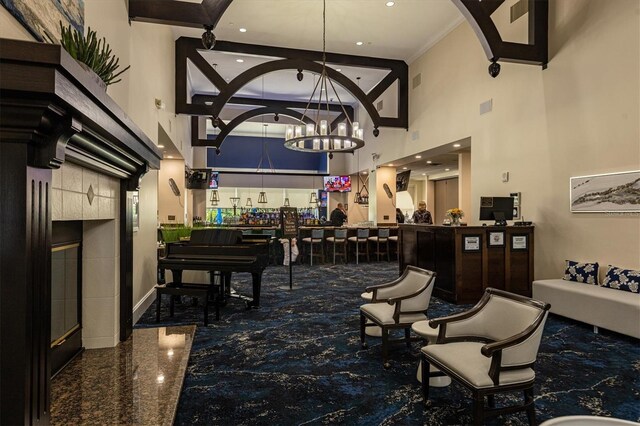 9630 Club S Cir Unit 6303, Sarasota, FL 34238 - building lobby with a high ceiling, recessed lighting, and ornamental molding