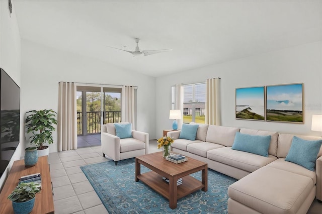 9630 Club S Cir Unit 6303, Sarasota, FL 34238 - living area with healthy amount of natural light, ceiling fan, tile patterned flooring, and vaulted ceiling