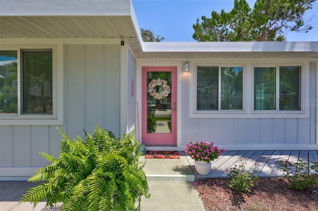 643 Calle Del Otono, Sarasota, FL 34242 - doorway to property with board and batten siding