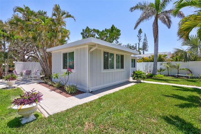 643 Calle Del Otono, Sarasota, FL 34242 - view of home's exterior featuring board and batten siding and a patio