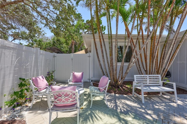 643 Calle Del Otono, Sarasota, FL 34242 - fenced backyard with a patio and a gate