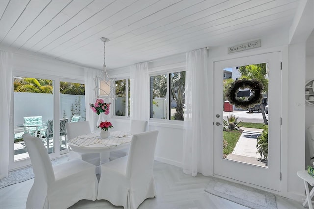 643 Calle Del Otono, Sarasota, FL 34242 - sunroom featuring plenty of natural light and a chandelier