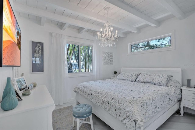 643 Calle Del Otono, Sarasota, FL 34242 - bedroom featuring a chandelier, wood ceiling with exposed beams, and baseboards