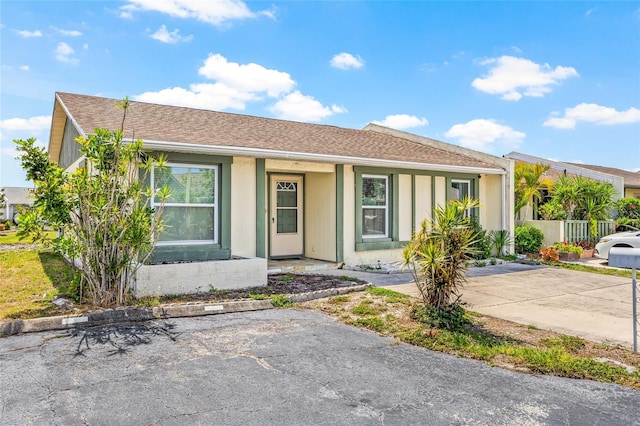 3901 41st St W, Bradenton, FL 34205 - ranch-style home with covered porch, uncovered parking, and a shingled roof