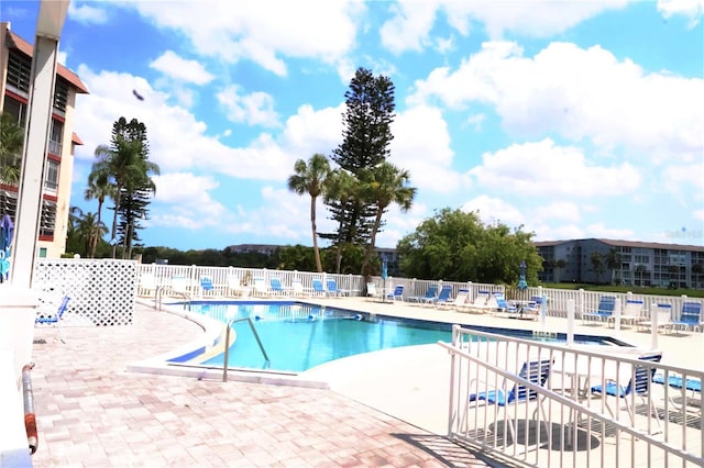 4154 Heron Way Unit 203B, Bradenton, FL 34205 - community pool with a patio