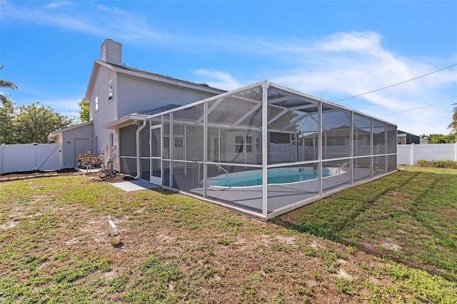 5310 SW 25th Ct, Cape Coral, FL 33914 - rear view of property with a chimney, a gate, and a patio area
