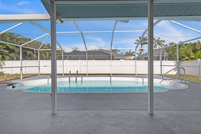 5310 SW 25th Ct, Cape Coral, FL 33914 - view of swimming pool with a patio area, a fenced backyard, and glass enclosure
