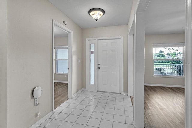 5310 SW 25th Ct, Cape Coral, FL 33914 - foyer entrance with baseboards and light tile patterned floors
