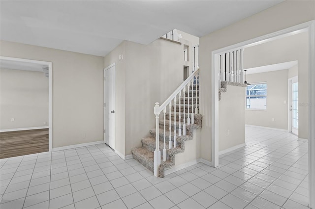 5310 SW 25th Ct, Cape Coral, FL 33914 - stairs with tile patterned floors and baseboards