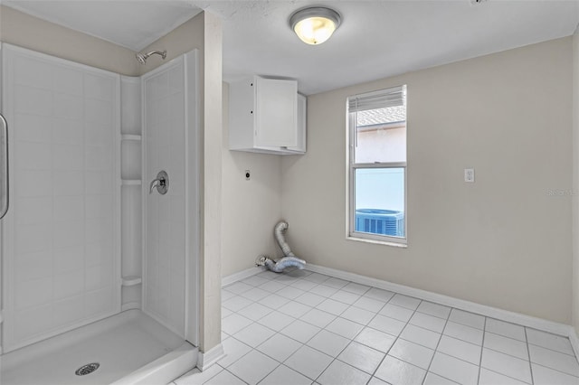 5310 SW 25th Ct, Cape Coral, FL 33914 - full bathroom with a shower stall, baseboards, and tile patterned floors