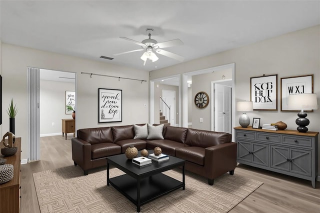 5310 SW 25th Ct, Cape Coral, FL 33914 - living area featuring light wood-style floors and a ceiling fan
