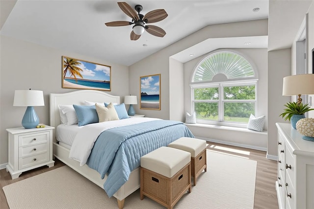 5310 SW 25th Ct, Cape Coral, FL 33914 - bedroom featuring vaulted ceiling, light wood-style floors, baseboards, and a ceiling fan