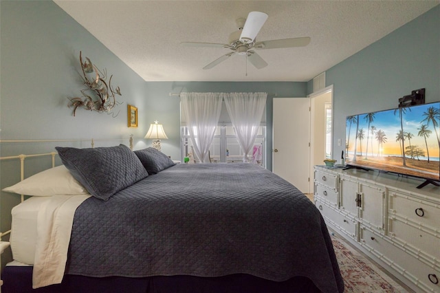 11021 4th Ave E, Bradenton, FL 34212 - bedroom featuring ceiling fan and a textured ceiling