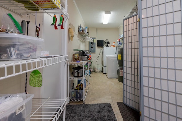 11021 4th Ave E, Bradenton, FL 34212 - laundry area with washer / dryer, electric panel, and tile patterned floors