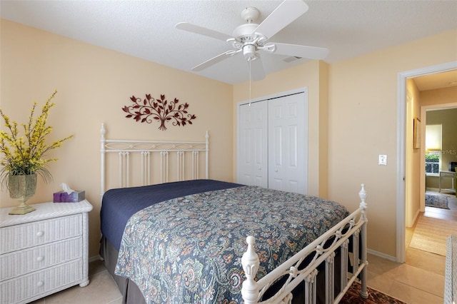 11021 4th Ave E, Bradenton, FL 34212 - bedroom with a closet, light tile patterned floors, ceiling fan, and baseboards