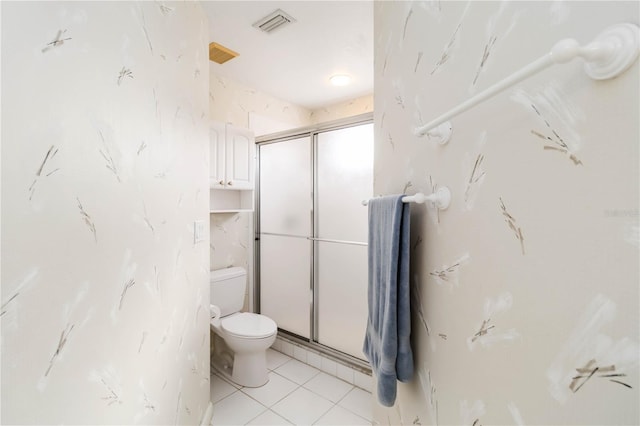 6572 Fairway Gardens Dr Unit 6572, Bradenton, FL 34203 - bathroom with toilet, a stall shower, and tile patterned flooring