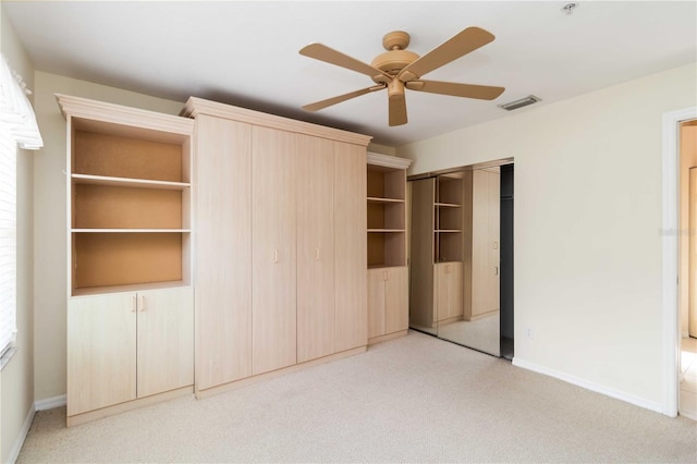 6572 Fairway Gardens Dr Unit 6572, Bradenton, FL 34203 - unfurnished bedroom with light colored carpet, baseboards, a closet, and a ceiling fan