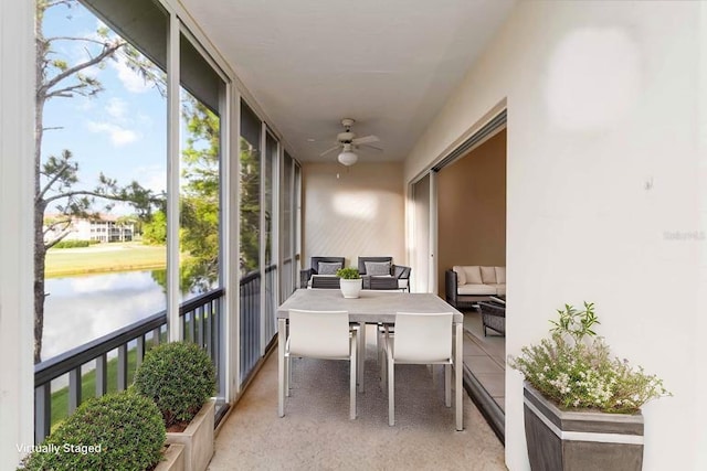6572 Fairway Gardens Dr Unit 6572, Bradenton, FL 34203 - sunroom / solarium featuring a ceiling fan, a water view, and healthy amount of natural light