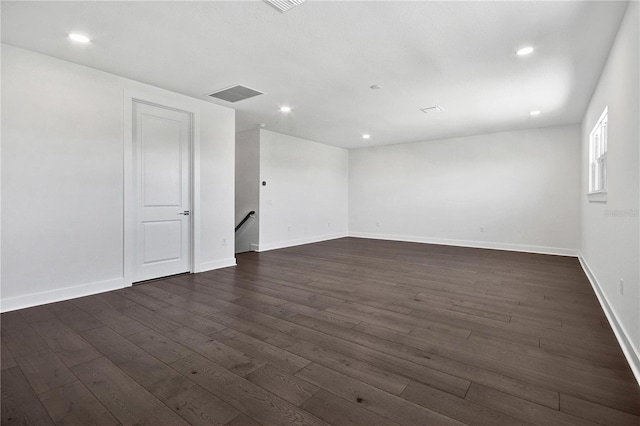 17723 Palmiste Dr, Bradenton, FL 34202 - spare room featuring dark wood-style flooring and recessed lighting