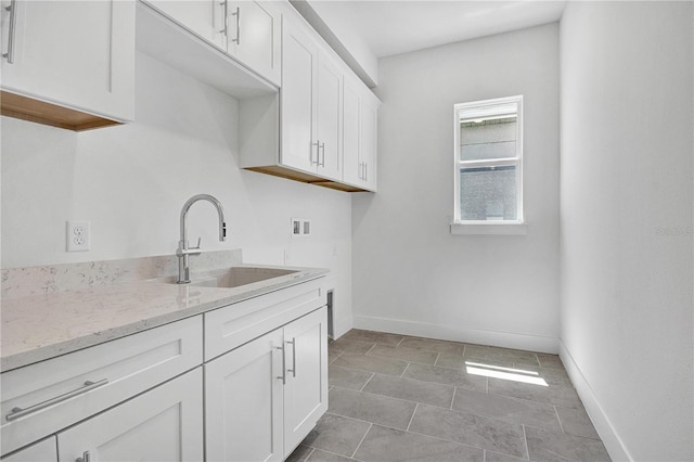 17723 Palmiste Dr, Bradenton, FL 34202 - washroom featuring cabinet space and hookup for a washing machine
