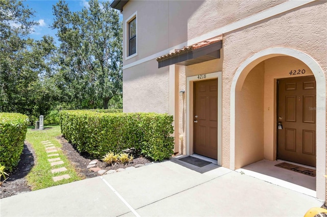 4220 Via Piedra Cir Unit 4-101, Sarasota, FL 34233 - property entrance featuring stucco siding
