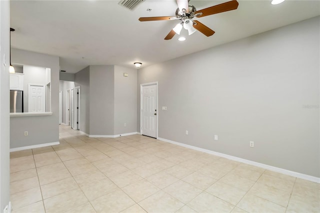 4220 Via Piedra Cir Unit 4-101, Sarasota, FL 34233 - empty room featuring ceiling fan, recessed lighting, baseboards, and light tile patterned floors