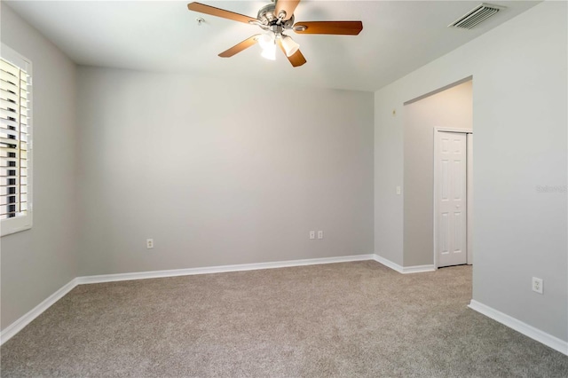 4220 Via Piedra Cir Unit 4-101, Sarasota, FL 34233 - carpeted empty room featuring a ceiling fan and baseboards
