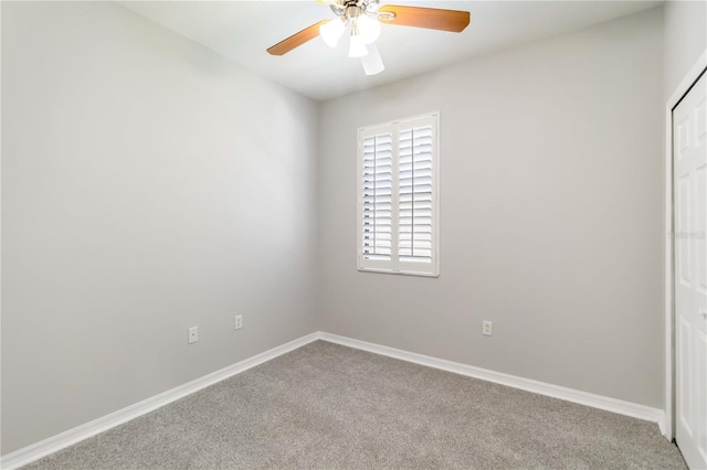 4220 Via Piedra Cir Unit 4-101, Sarasota, FL 34233 - unfurnished bedroom featuring carpet floors, baseboards, a closet, and a ceiling fan