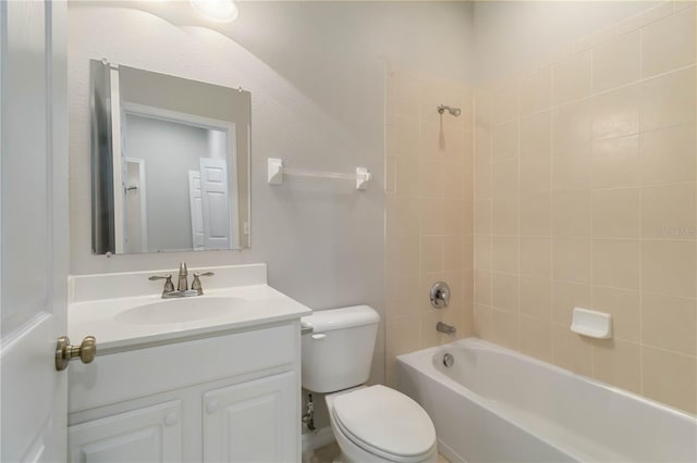 4220 Via Piedra Cir Unit 4-101, Sarasota, FL 34233 - bathroom featuring toilet, vanity, and  shower combination