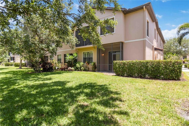 4220 Via Piedra Cir Unit 4-101, Sarasota, FL 34233 - view of front of property featuring stucco siding and a front lawn
