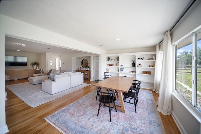 3810 Hidden River Rd, Sarasota, FL 34240 - dining space featuring wood finished floors and baseboards