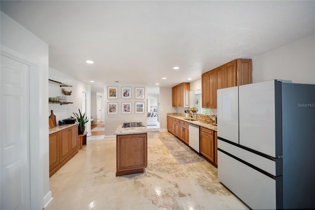 3810 Hidden River Rd, Sarasota, FL 34240 - kitchen featuring freestanding refrigerator, dishwasher, a kitchen island, brown cabinetry, and recessed lighting