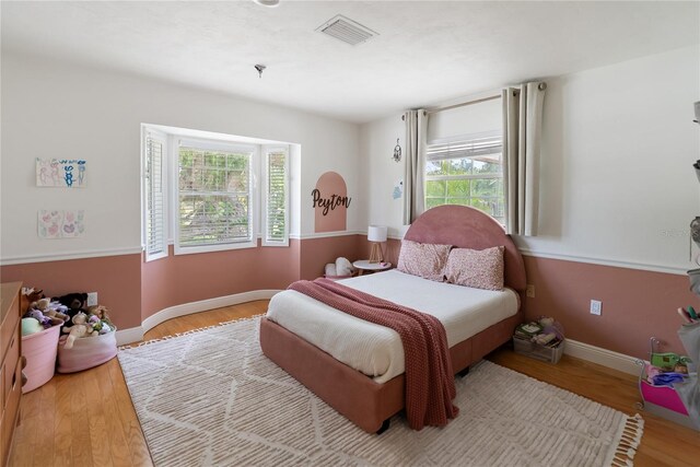 3810 Hidden River Rd, Sarasota, FL 34240 - bedroom with light wood finished floors and baseboards