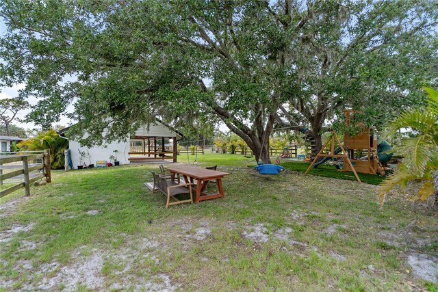 3810 Hidden River Rd, Sarasota, FL 34240 - view of yard with a playground