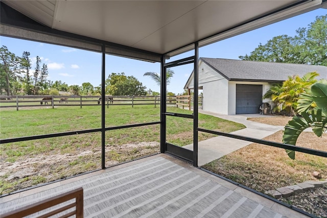 3810 Hidden River Rd, Sarasota, FL 34240 - unfurnished sunroom featuring a view of rural / pastoral area