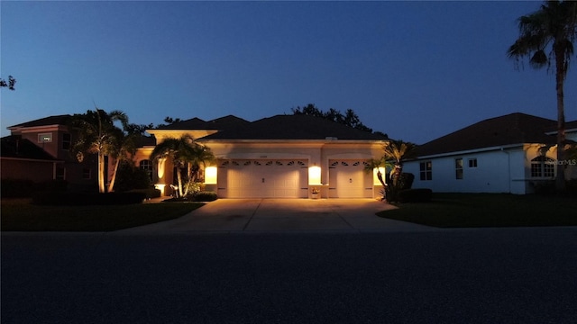 12358 Lavender Loop, Bradenton, FL 34212 - view of front of home featuring an attached garage and concrete driveway