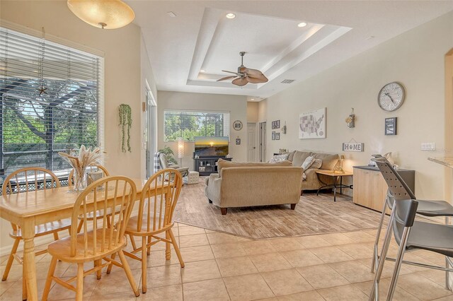 12358 Lavender Loop, Bradenton, FL 34212 - dining area with ceiling fan, a raised ceiling, light tile patterned floors, and recessed lighting