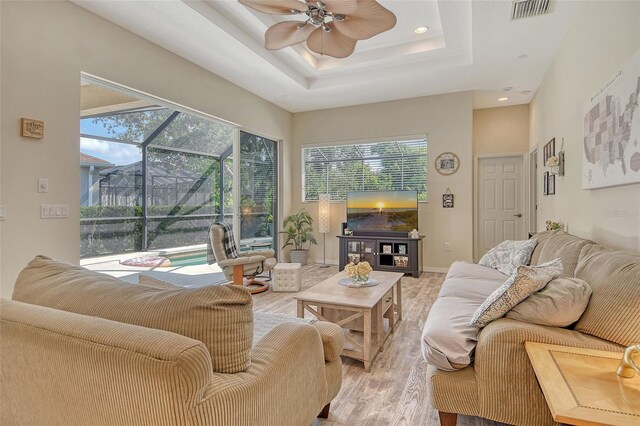 12358 Lavender Loop, Bradenton, FL 34212 - living room featuring ceiling fan, light wood finished floors, plenty of natural light, a sunroom, and recessed lighting