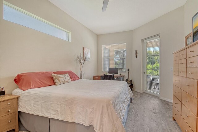 12358 Lavender Loop, Bradenton, FL 34212 - bedroom with light wood finished floors, access to outside, multiple windows, and a ceiling fan