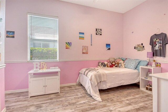 12358 Lavender Loop, Bradenton, FL 34212 - bedroom with light wood-type flooring and baseboards