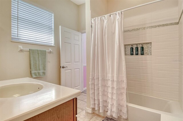 12358 Lavender Loop, Bradenton, FL 34212 - bathroom featuring vanity, shower / bath combo with shower curtain, and tile patterned floors