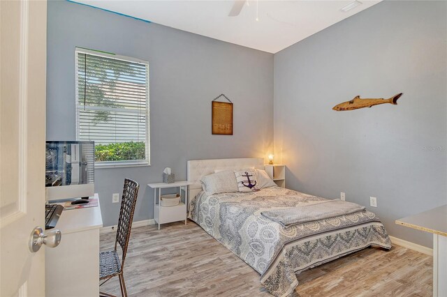 12358 Lavender Loop, Bradenton, FL 34212 - bedroom featuring wood finished floors, baseboards, and a ceiling fan