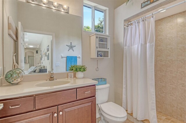 12358 Lavender Loop, Bradenton, FL 34212 - ensuite bathroom with vanity, toilet, and tiled shower