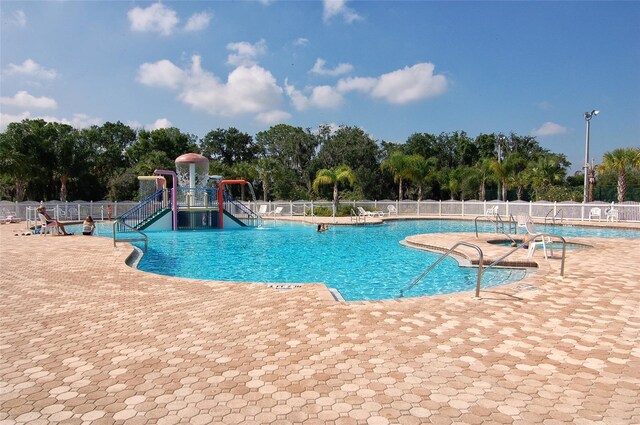 12358 Lavender Loop, Bradenton, FL 34212 - community pool featuring view of scattered trees and a patio