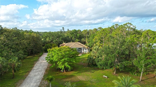 950 Trotter St, Nokomis, FL 34275 - aerial overview of property's location with a heavily wooded area